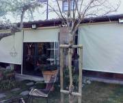 Tenda da sole a caduta per verande finestrate